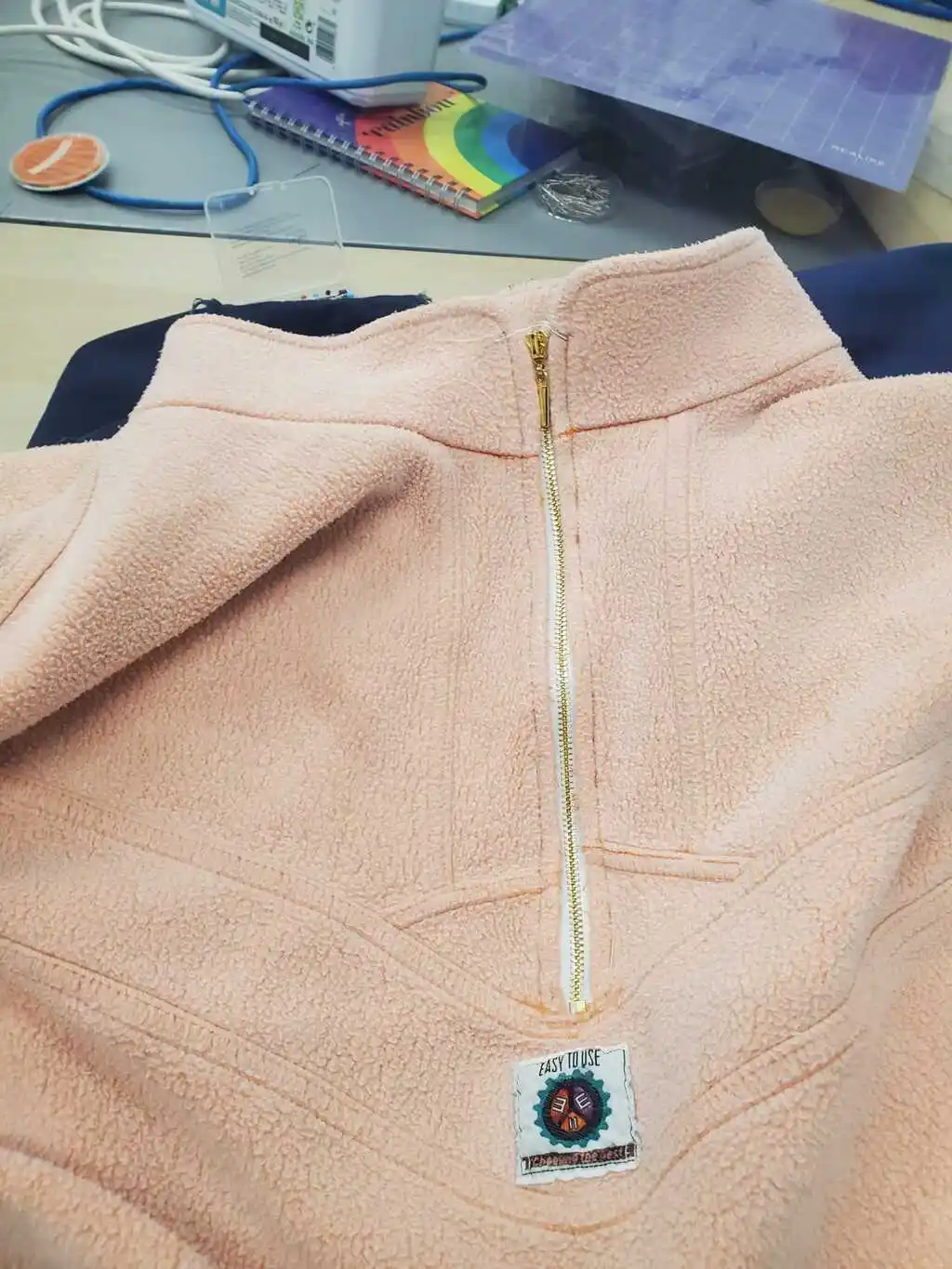 picture of a pink jacket with zip attached